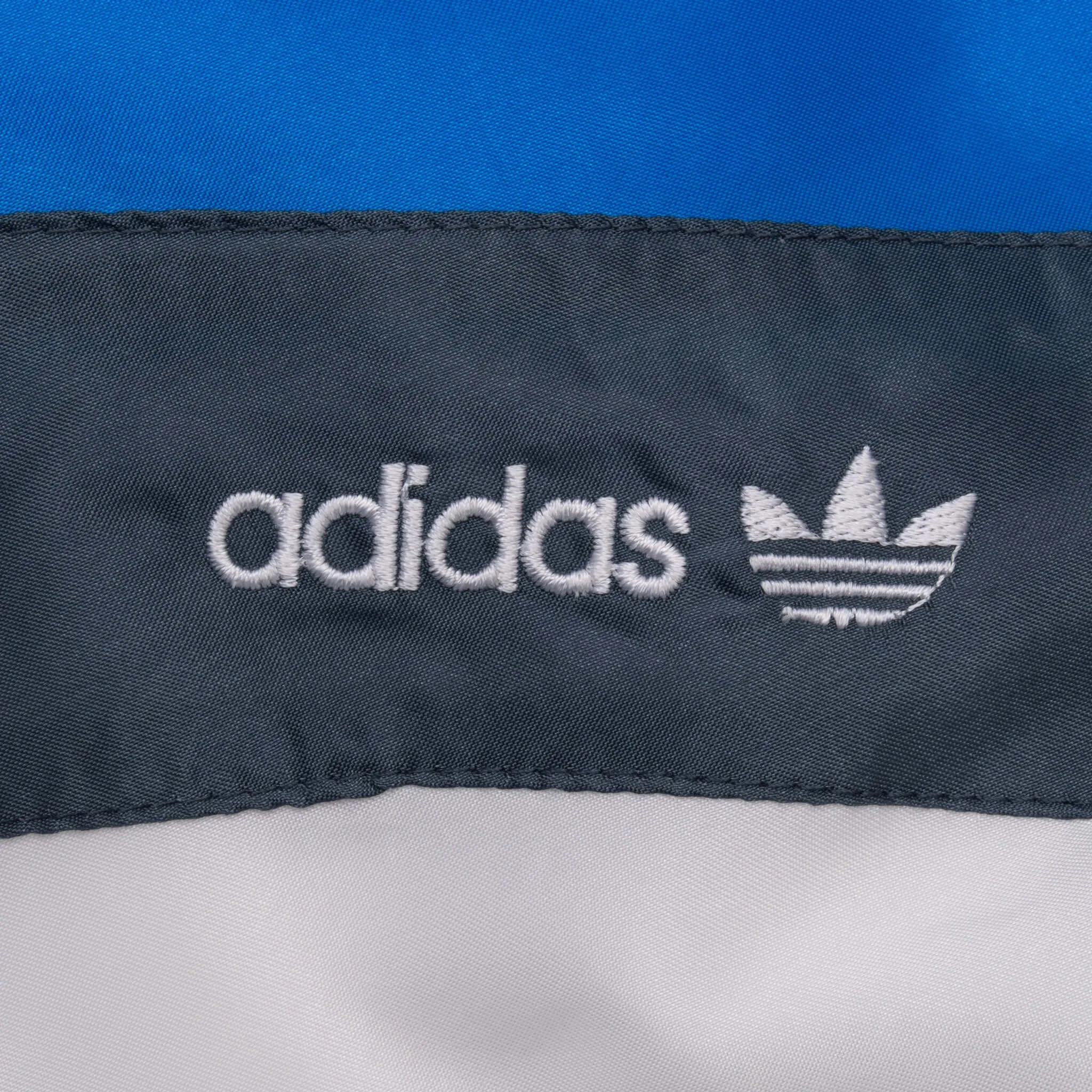 VINTAGE ADIDAS BLUE AND BLUE TRACK JACKET 1980S LARGE